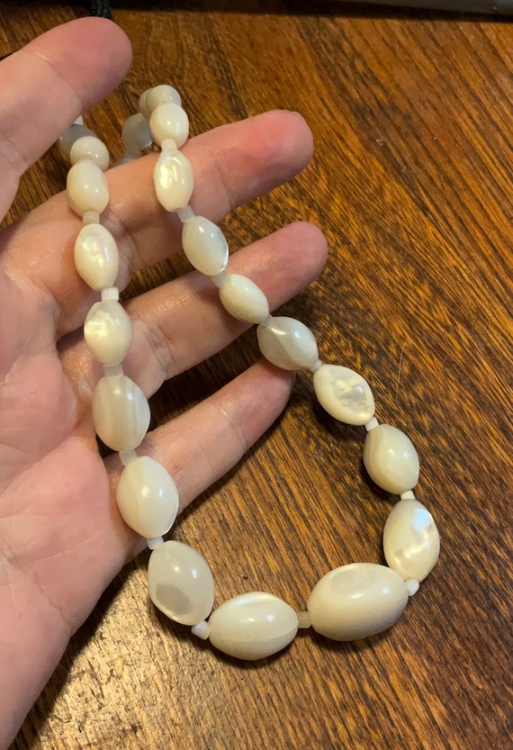 Antique graduated, mother of pearl beads 20 inches