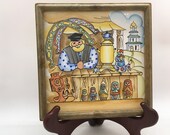 Russian Framed Ceramic Pictorial Art Tile Vendor, Nesting Dolls and Samovar Tea Pot
