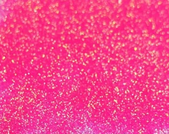May include: A close-up of a pink glitter background with a slight gradient from a darker pink to a lighter pink. The glitter is iridescent and reflects light in a variety of colors.