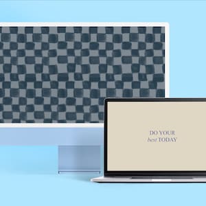 May include: A desktop computer and laptop with motivational text on the screen. The desktop computer has a blue and gray checkered pattern on the screen. The laptop screen has a beige background with the text "DO YOUR best TODAY" in blue.
