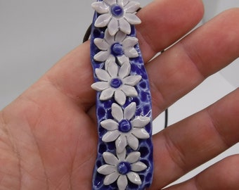 five lavender flowers on blue pendent, original porcelain necklace