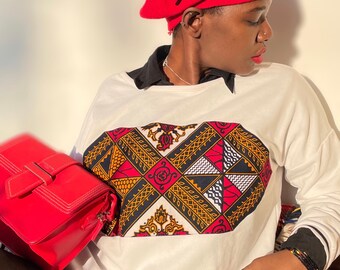 Unisex off white cream sweatshirt pullover designed with an African fabric in the front