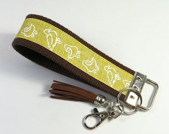 Bracciali in tessuto DUCKS, portachiavi marrone, portachiavi da polso, portachiavi design anatre