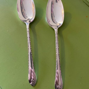 2 vintage WM Rogers & son silver spoons