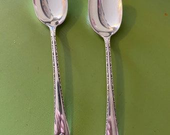 2 vintage WM Rogers & son silver spoons