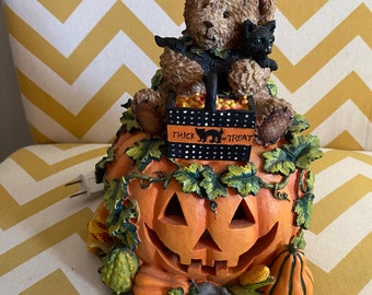 Adorable teddy bear on a pumpkin Halloween light