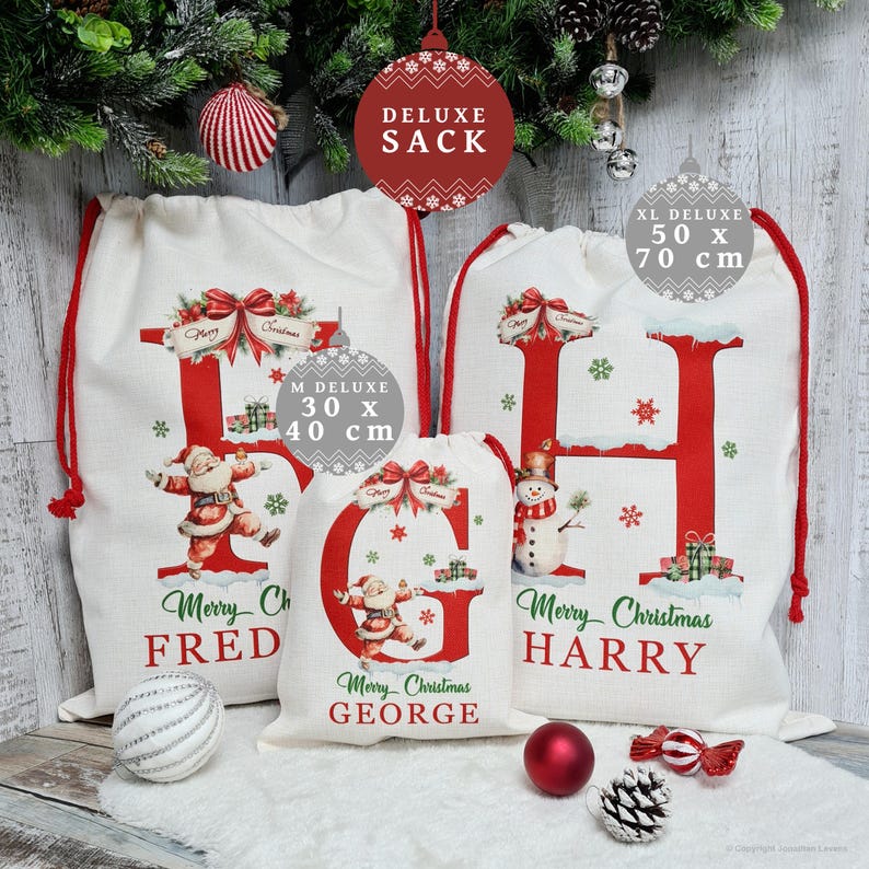 May include: White Christmas sacks with red drawstrings, featuring large red letters and festive illustrations. The sacks are labeled "DELUXE" and come in various sizes, including a 30 x 40 cm and a 50 x 70 cm option. The text "Merry Christmas" is also visible.