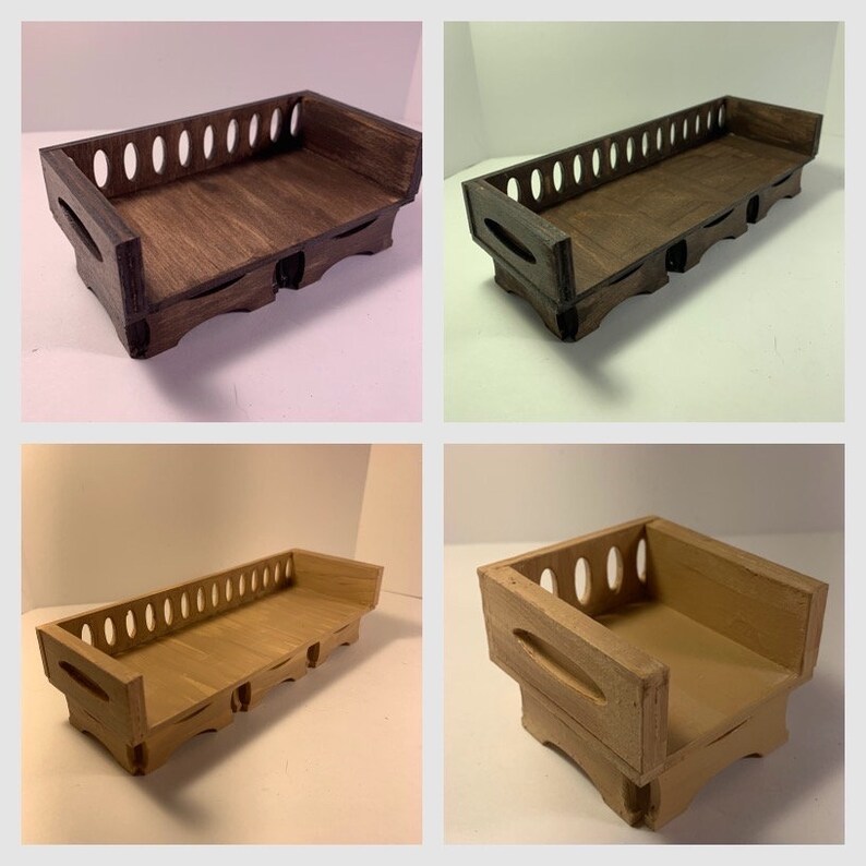 May include: Four images of wooden trays. The trays are rectangular with a series of oval cutouts along the top edge. They have curved cutouts on the sides for handles. The wood is stained in various shades of brown and tan.