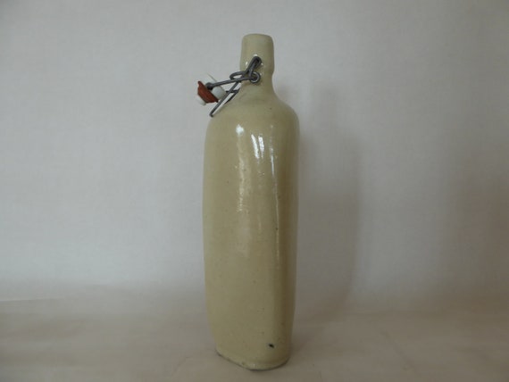 Vintage French Triangular Cream Glazed Stoneware Bottle with Wire Clasp Pot Stopper 0320015-949 Please request shipping cost for USA