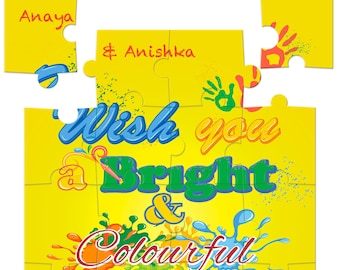 May include: A yellow puzzle card with a colorful Holi greeting. The card says "Wish you a Bright & Colourful Holi" with the word "Holi" in large, colorful letters. The card is addressed to Anaya & Anishka and signed with love from Rahul & Sheetal.