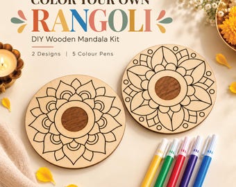 May include: A DIY wooden mandala kit featuring two circular wooden discs with intricate mandala line art and a dark wood center. The set includes five colored pens in yellow, green, red, purple, and blue. Text reads: COLOR YOUR OWN RANGOLI DIY Wooden Mandala Kit 2 Designs | 5 Colour Pens.
