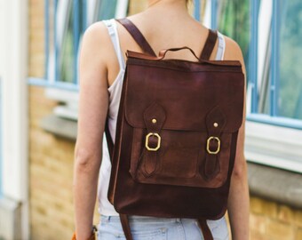 Leather Backpack In Brown With Flap And Buckles