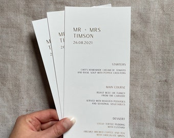 Personalised gold foil wedding menus. Luxury wedding reception menu cards.
