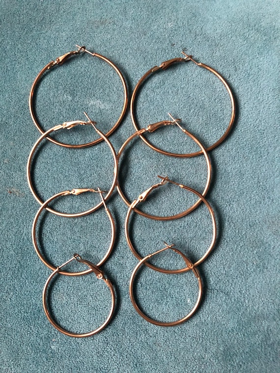 Four Pair of Different Size Gold Tone Hoop Earring