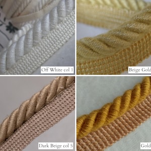May include: Close-up of four decorative trim samples. Colors include off-white, beige gold, dark beige, and gold. Each trim features a twisted rope design with a woven edge. The text labels each color: "Off White col 1", "Beige Gold col 3", "Dark Beige col 5", and "Gold col 6".