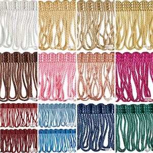 Puede incluir: Una colección de 10 diferentes colores de ribete de flecos, cada uno con un código de color diferente. Los colores incluyen blanco, dorado, rosa, marrón, rojo, azul, verde y más.
