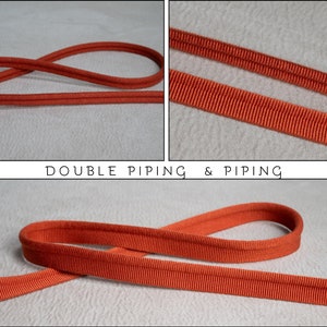 May include: Two pieces of orange piping, one is double the width of the other.  The piping is ribbed and has a subtle sheen.