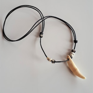 Unisex vintage large tooth pendant necklace black leather cord
