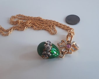 Vintage designer green iridescent enamel egg pendant necklace with bow gripoix glass cabochon