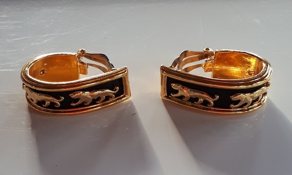 Vintage Designer Couture gold metal panthers on bl