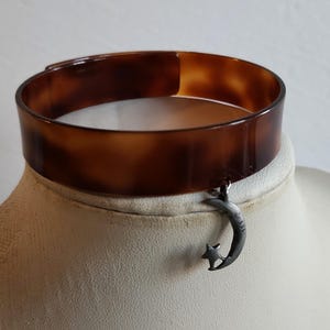 Ameri（アメリ）の「UPPER ARM BANGLE（バングル/リストバンド