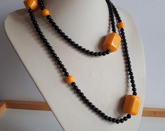 Vintage Retro black and yellow orange plastic resin beaded station necklace