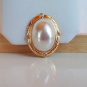 Vintage Victorian revival gold metal encrusted rhinestone oval scarf clip with big faux pearl cabochon