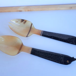 never used Vintage carved horn salad server spoon and fork set with fish shape handle from Vietnam