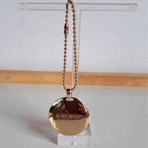 Vintage signed NINE WEST gold metal big domed disk disc purse charm or keychain, designer charm,