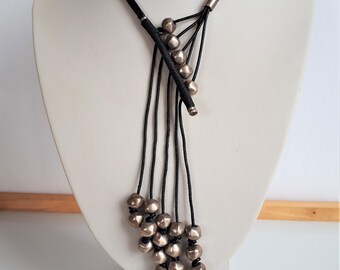 UNOde50 Uno de 50 Madrid Spain designer retired statement sculptural architectural bib waterfall necklace silver metal black leather