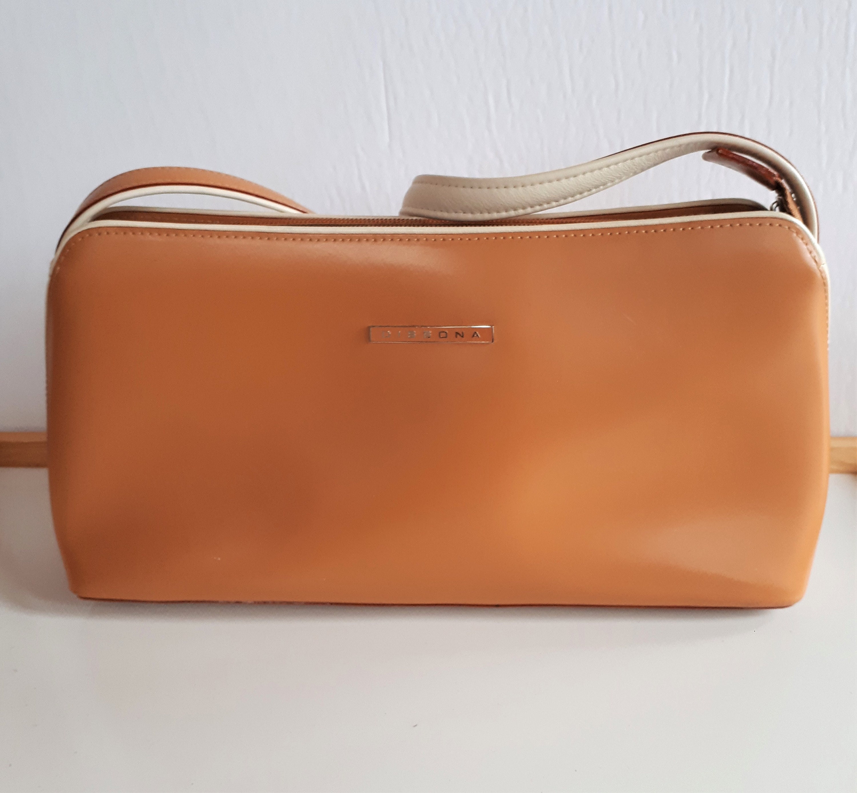 DISSONA GOLD LEATHER BAG