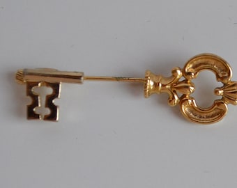 Vintage AVON goud metalen figural antieke sleutelhanger pin