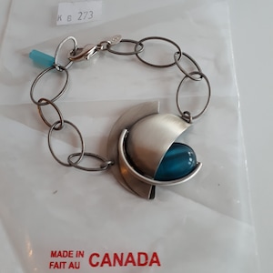 Bracciale vintage CHRISTOPHE POLY firmato, prodotto in Canada, in metallo argentato spazzolato con accenti blu, stile modernista