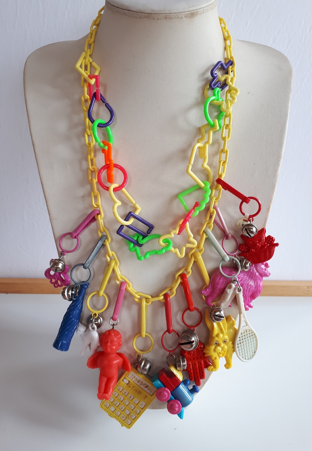 Vintage 80s Multicolor Plastic Charm Necklace With 11 Huge Figural Charms on Yellow Lucite