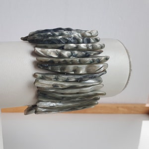 Wide rustic hand carved dyed grey iridescent MOP mother of pearl shell stretch bracelet
