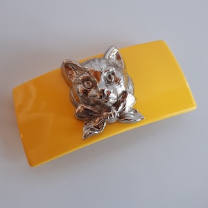 large Vintage yellow plastic rectangular hair barrette with silver metal cat with bow head portrait
