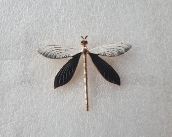 large vintage white black painted gold colored metal dragonfly insect brooch pin