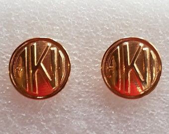 ANNE KLEIN signed gold metal domed round pierced earrings with designer's logo