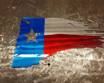 Texas flag tattered and torn metal art. Painted like the Texas flag. Made from high quality aluminum so it will never rust. *Steel will rust