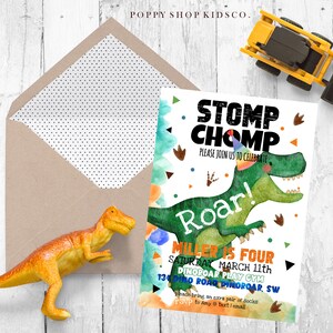 May include: A green dinosaur with a party hat and the words "Stomp Chomp" and "Roar!" on a white background. The text "Miller is Four" and "Saturday March 11th" is also on the invitation. The invitation is for a dinosaur themed birthday party.