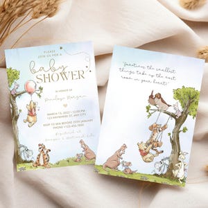 May include: Baby shower invitations featuring Winnie the Pooh characters. The invitations have a watercolor design with the text "Baby Shower" and event details. One card shows Pooh with a balloon, the other shows Pooh and friends on a swing.