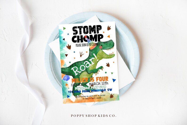 May include: A colorful dinosaur birthday party invitation with a green dinosaur wearing a party hat and the text "Stomp Chomp Roar! Miller is Four Saturday March 11th DinoRoar Play Gym 134 Dino Roar Dinoroar, SW".