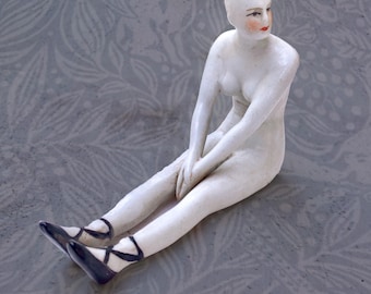 The Odd One Out – Vintage Porcelain Doll Figurine