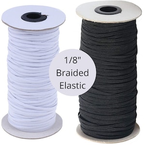 May include: Two spools of 1/8 inch braided elastic, one white and one black. The spools are labeled "1/8" Braided Elastic".