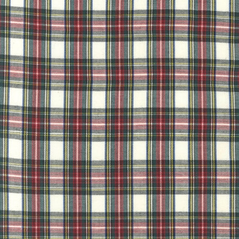 May include: White fabric with a red, green, and blue plaid pattern.