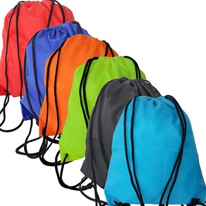 May include: Six drawstring bags in different colors: red, blue, orange, green, gray, and light blue. The bags are made of a lightweight fabric and have a simple design.