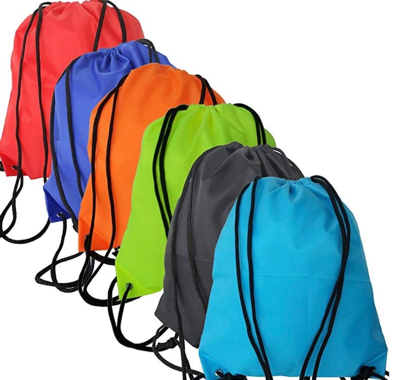 May include: Six drawstring bags in different colors: red, blue, orange, green, gray, and light blue. The bags are made of a lightweight fabric and have a simple design.