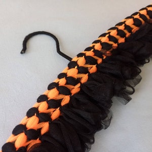 Cintre rembourré des années 60 - Orange et Noir