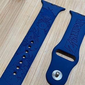 Anime dragon themed engraved design on a silicone watch band compatible with Apple Watch and Galaxy Watch .