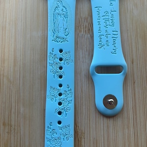 Religious, Virgin of Guadalupe themed engraved design on a silicone watch band compatible with Apple Watch and Galaxy Watch .